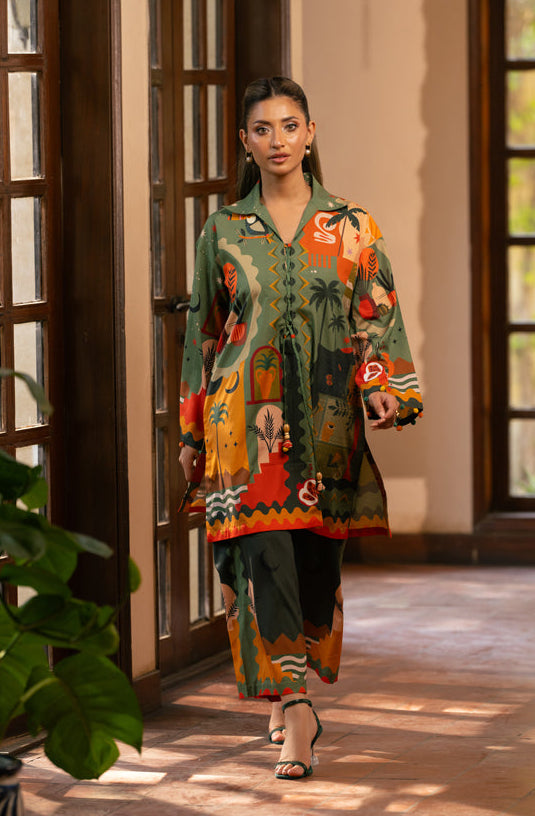 Woman in a colorful patterned outfit walking through a sunlit room with wooden floors and large windows.